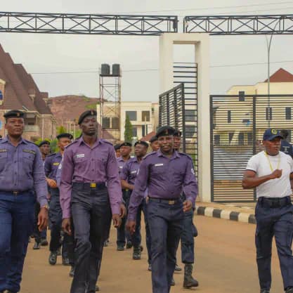 Naval ratings marching through the base gate